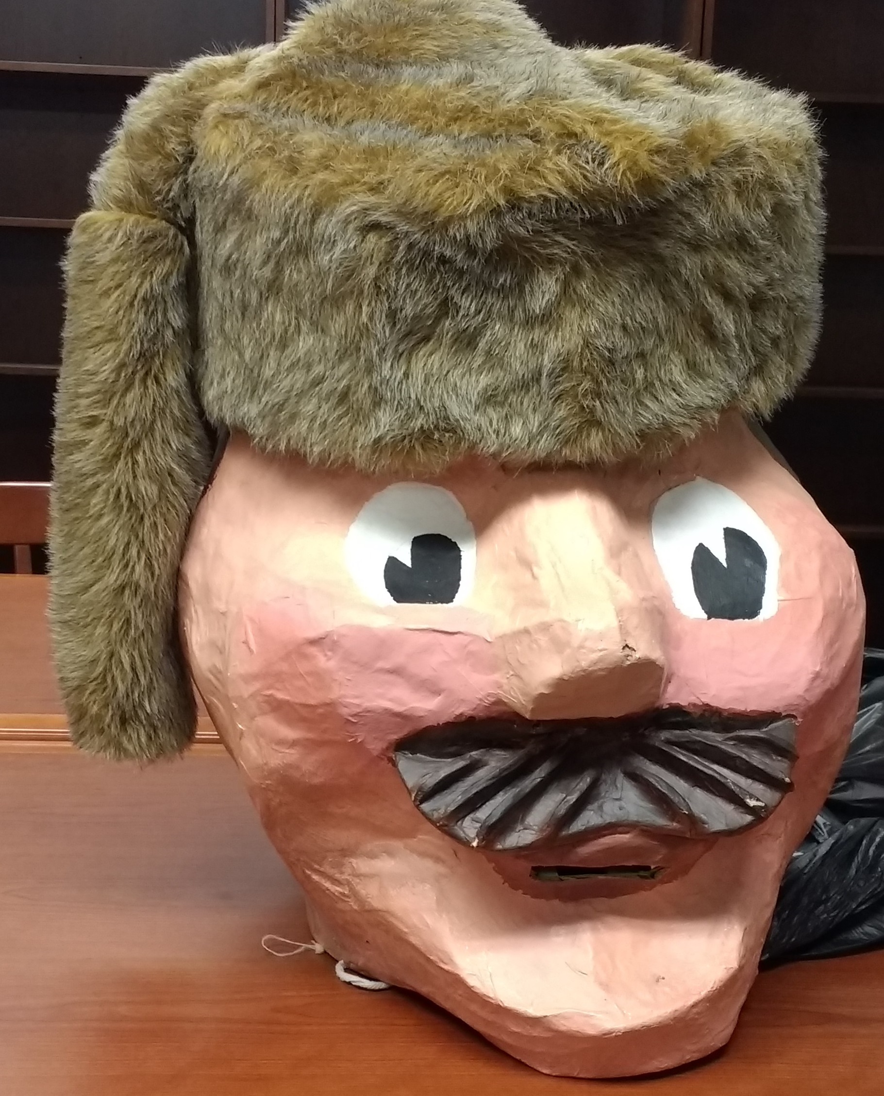 The paper mache head of the Pioneer Pete mascot.
